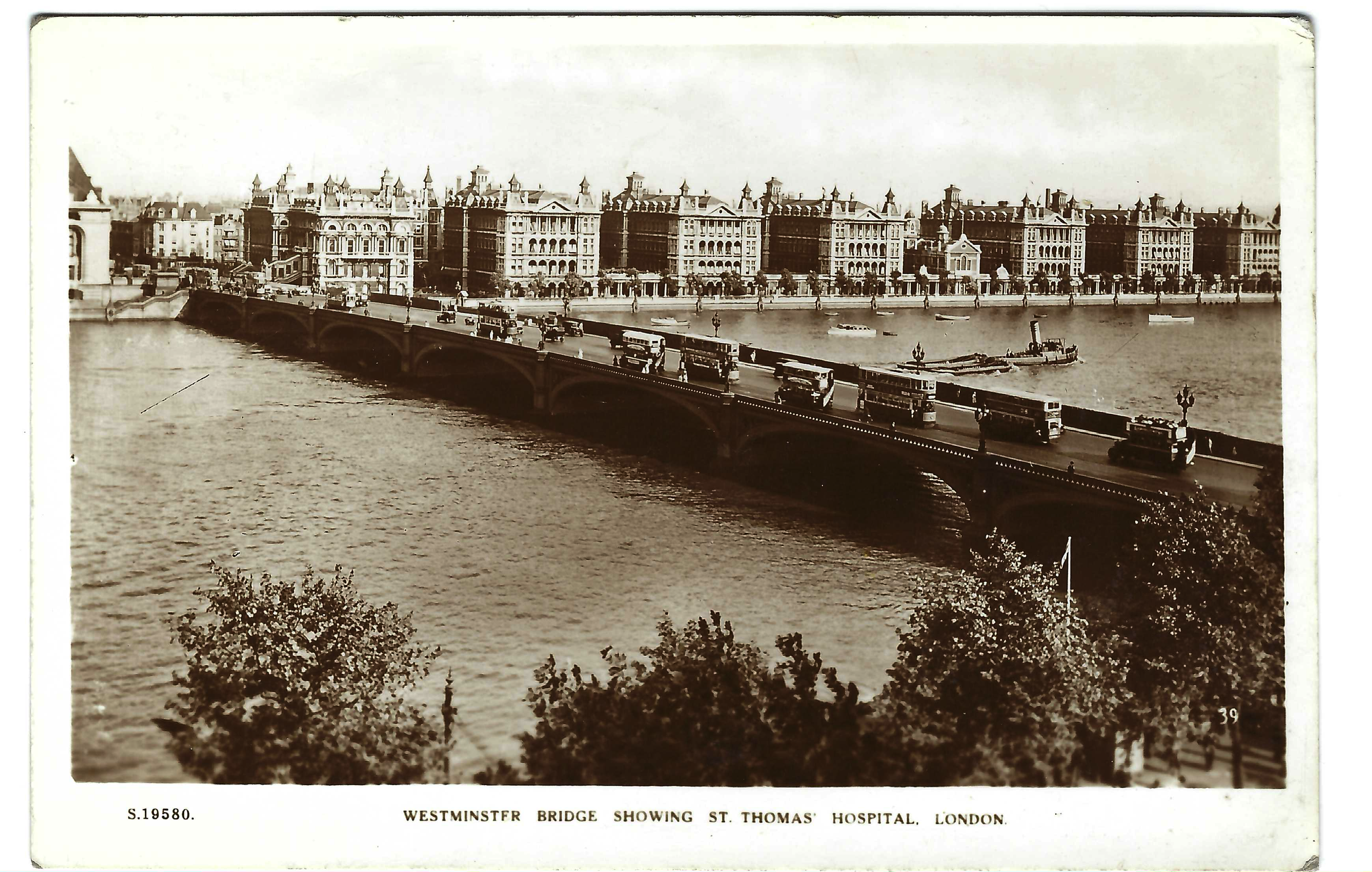 Westminster Bridge and St. Thomas’ Hospital in London, photographic postcard, 1930s.  Bridge House Real Photo Series (1930s–1940) by publisher W. H. Smith