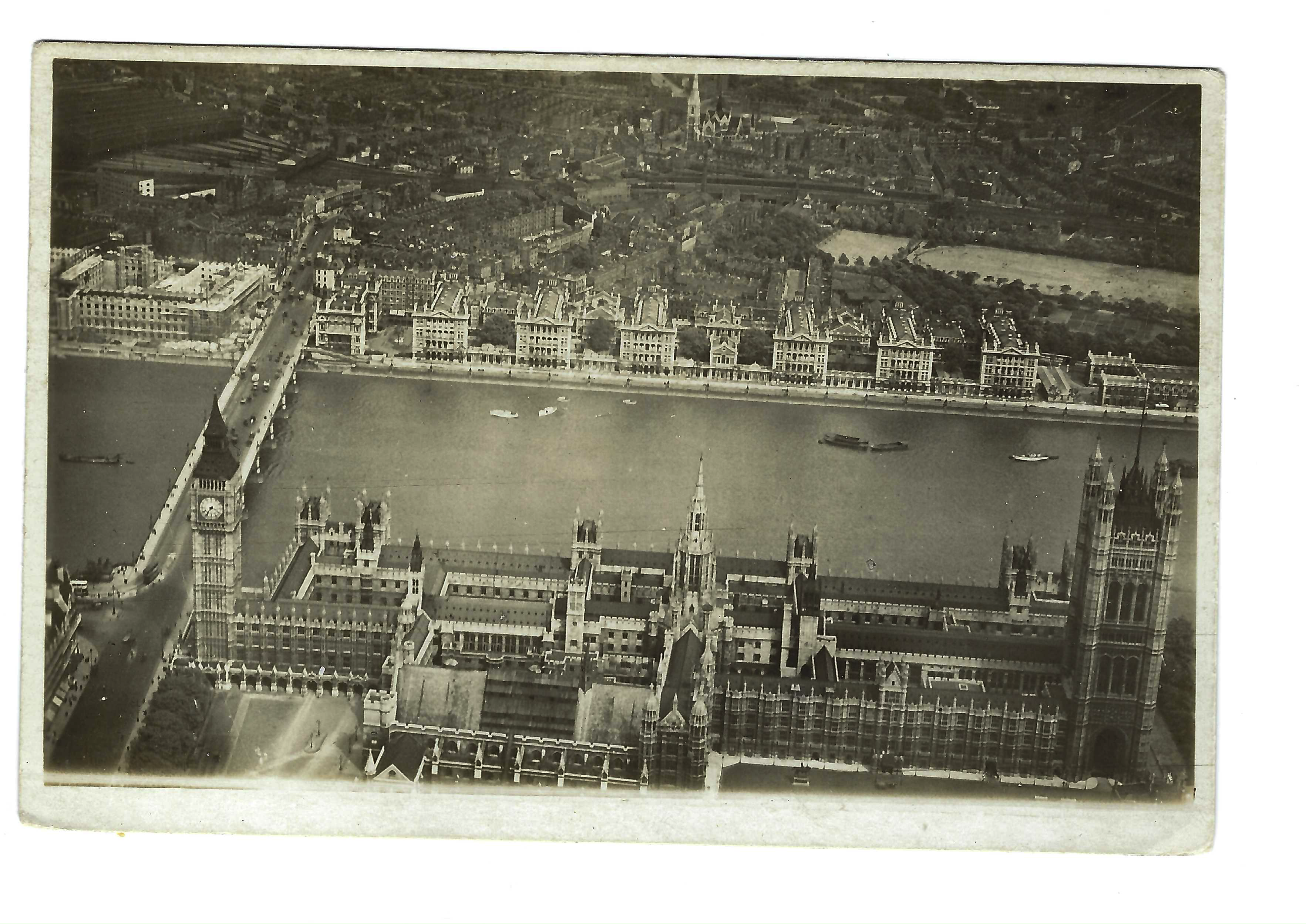 Aerial view of Houses of Parliament, Westminster Bridge and St Thomas Hospital, postcard c. 1919–1920. View recto