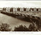 Westminster Bridge and St. Thomas’ Hospital in London, photographic postcard, 1930s.  Bridge House Real Photo Series (1930s–1940) by publisher W. H. Smith