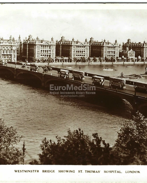 Westminster Bridge and St. Thomas’ Hospital in London, photographic postcard, 1930s.  Bridge House Real Photo Series (1930s–1940) by publisher W. H. Smith