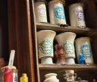Jars presented in the cabinet in vintage pharmacy