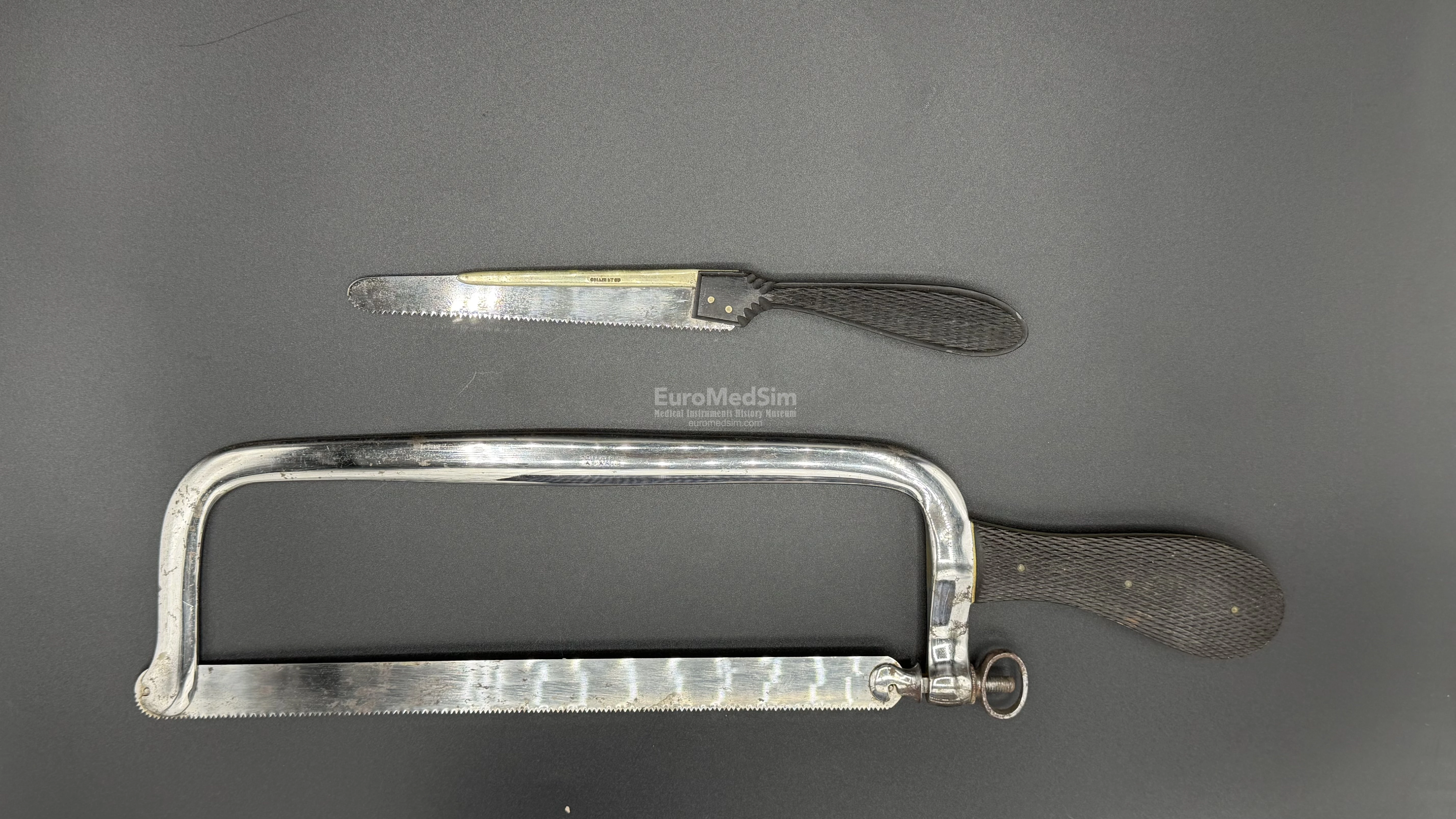 The metacarpal saw (marked COLLIN ET Cie), and the bow amputation saw type Charriére (marked COLLIN & CIE Á PARIS)