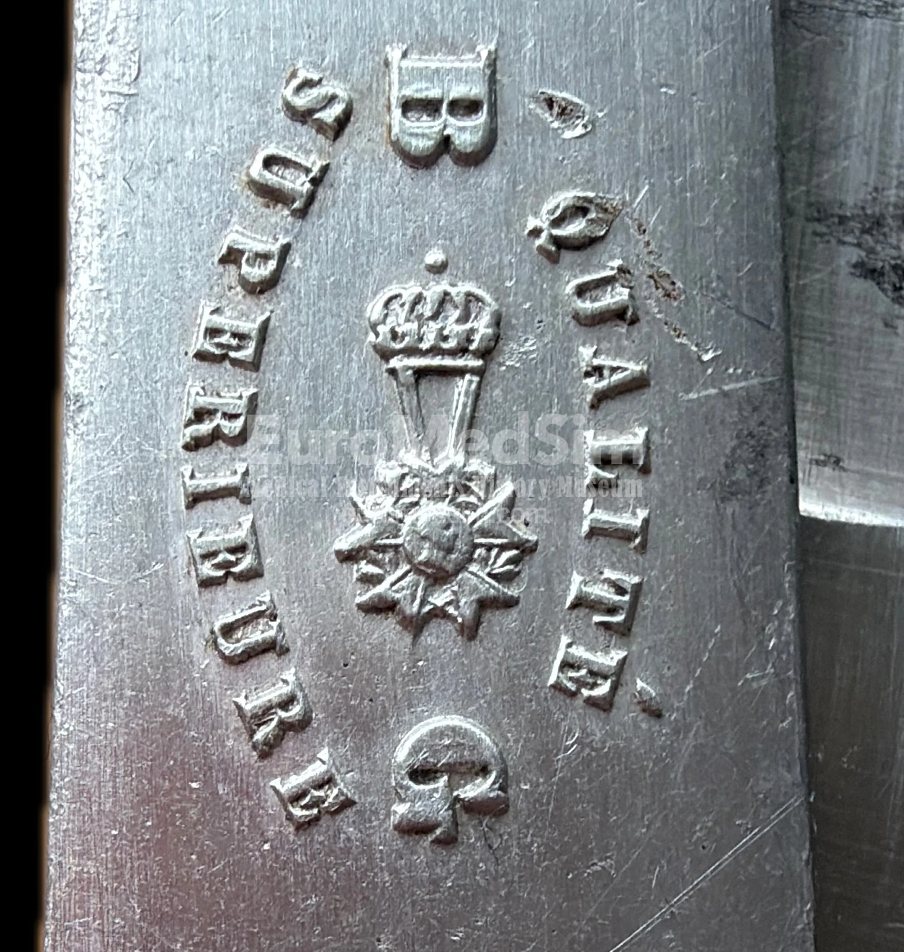 National Order of the Legion of Honour (French: Ordre national de la Légion d'honneur) engraved on the trade mark. B and G stand for Brene Guillaumot