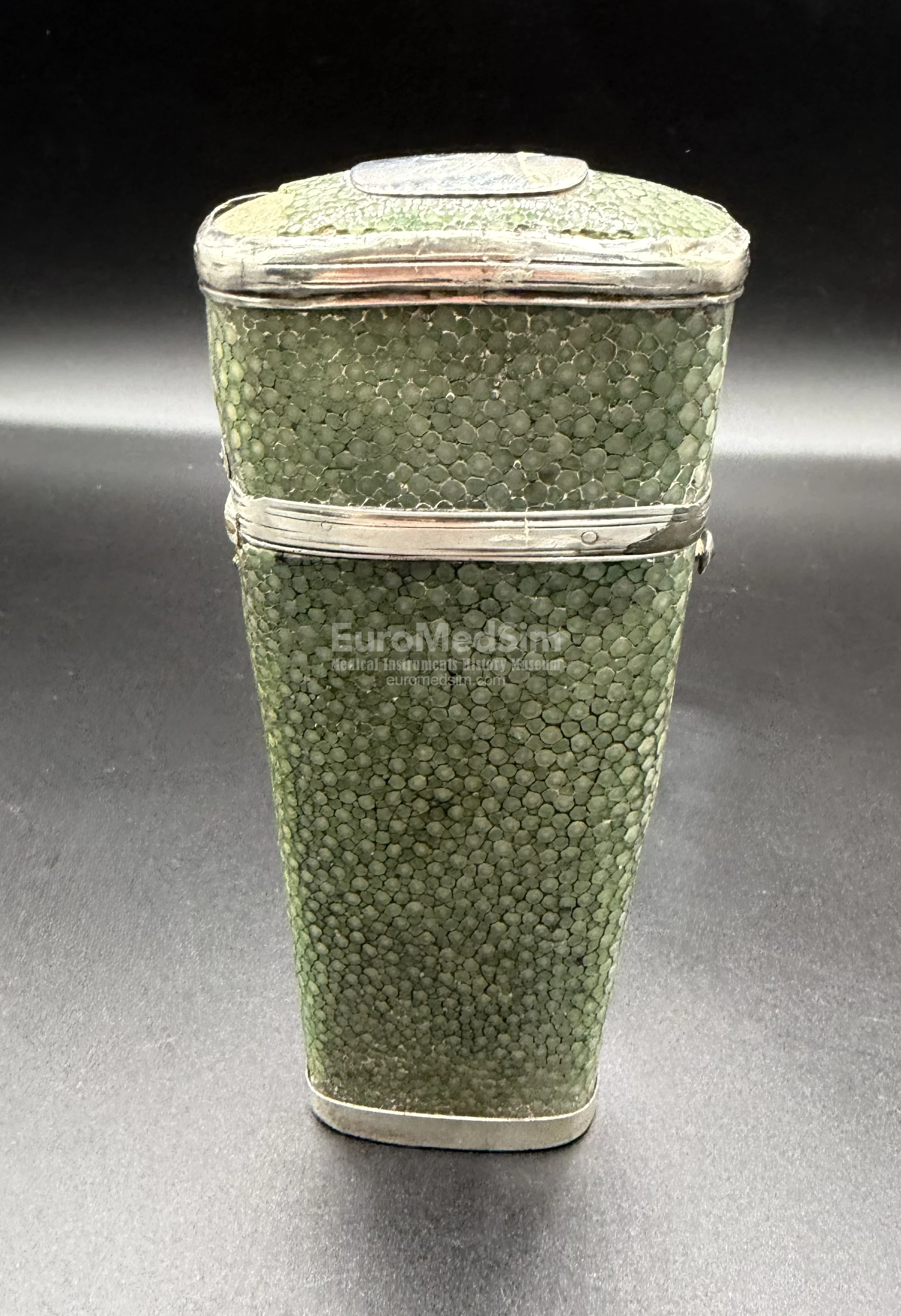 A shagreen-covered medical instruments pocket case, painted in a traditional green color with white shiny metal trim, England, ca. 1800