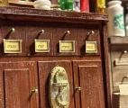 bureau of drawers with doors and lockers  in vintage pharmacy