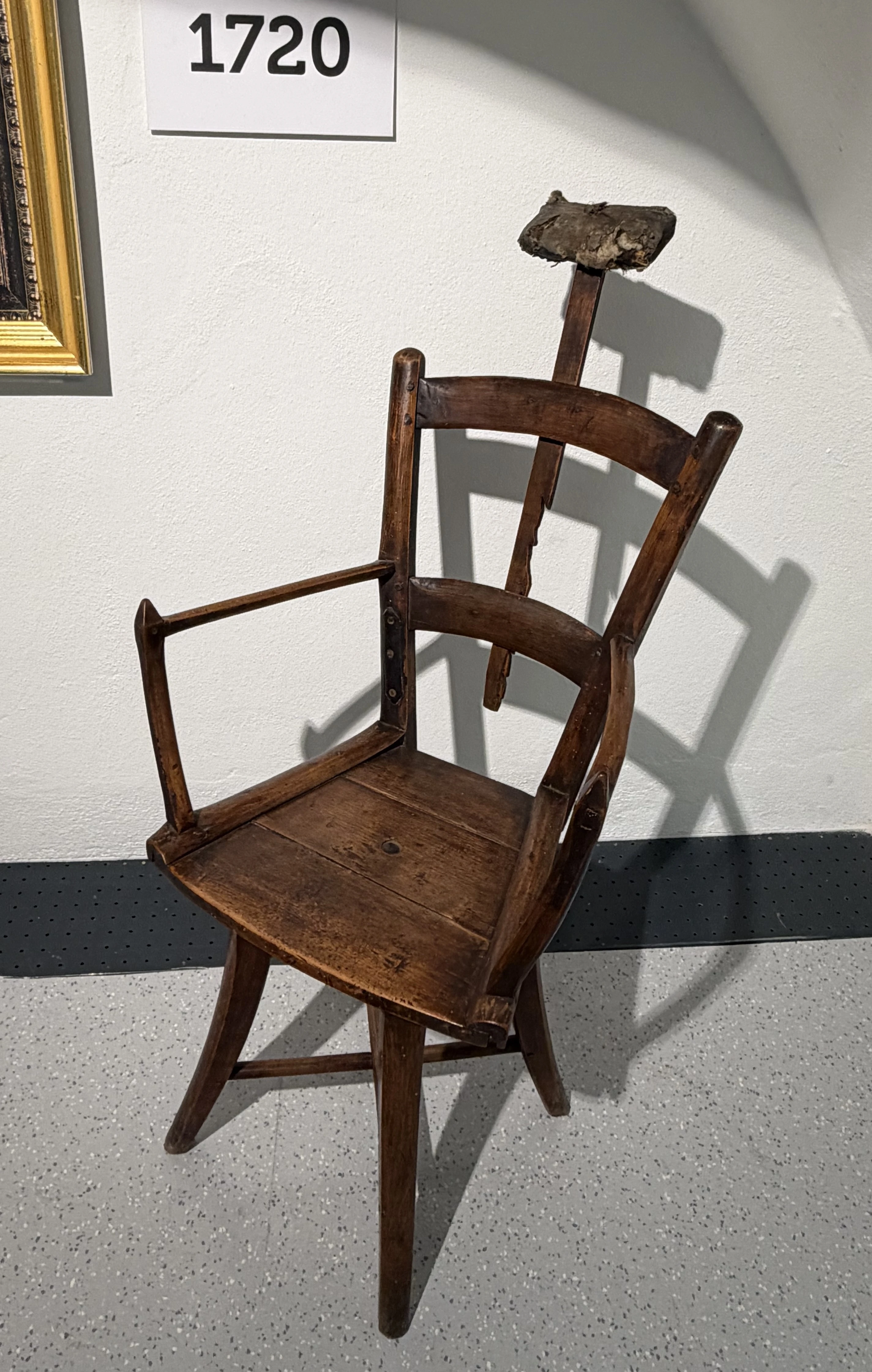 The chair of the barber dated 1720 in the Zahnmuseum (Dental Museum) in Linz, Austria