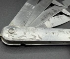 "Déposé" engraving. Detail of the Art Nouveau aluminium scale of the vintage French multi-bladed fleam.