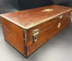 Mahogany box with two fasteners, lock (key available), brass plaque on the upper lead (unsigned), and carrying handle (on the opposite end)